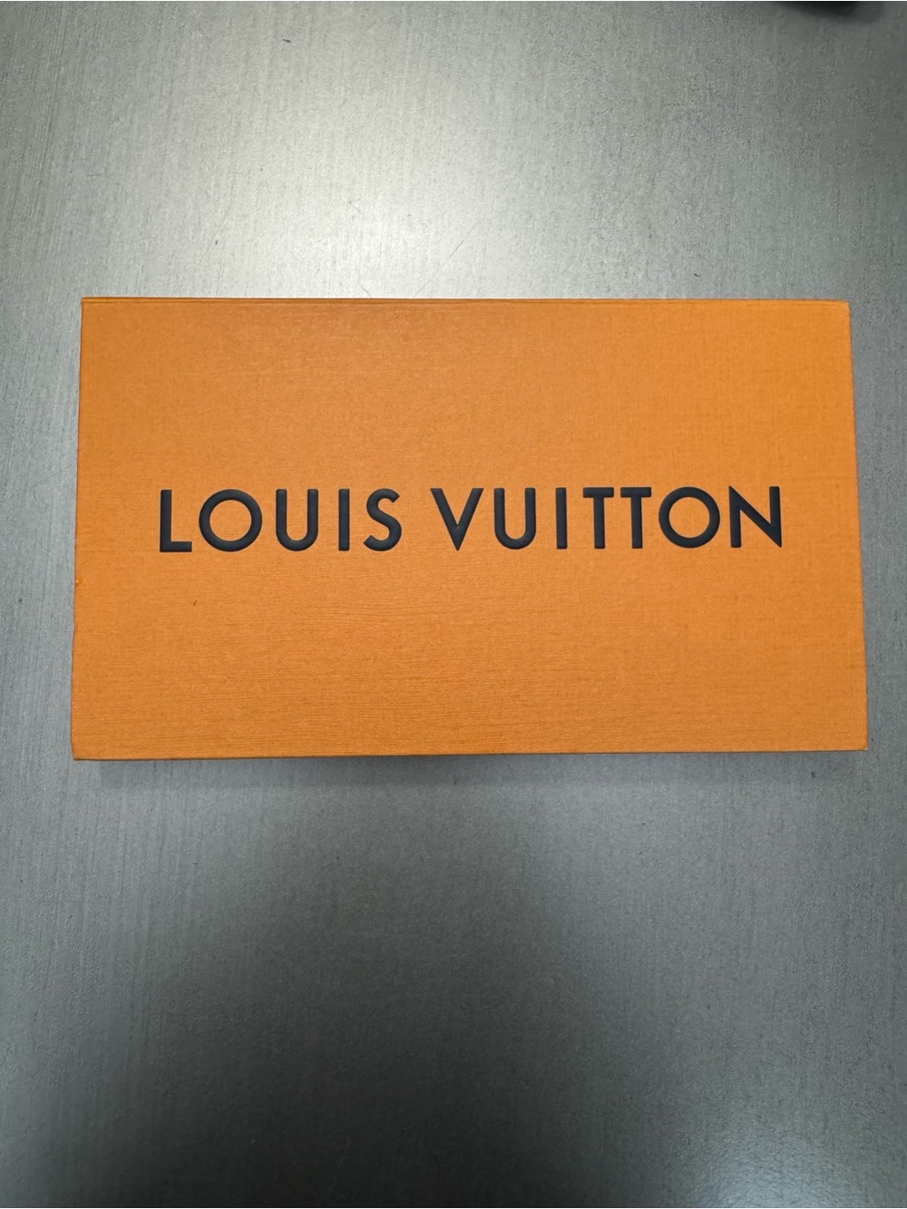 Louis Vuitton Orange and Black Logo card holder gift box.